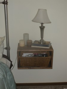 I won't bore you with a bunch of photos of shelves. But trust me, they are amazing. I'll leave you with just this - one of our floating nightstands. I heart them.